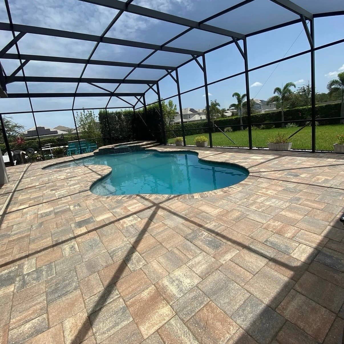Before and after paver cleaning and sealing in Jacksonville, FL
