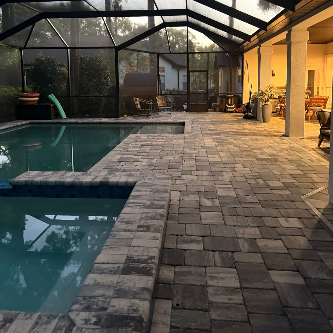Pool deck surface restored with soft wash cleaning
