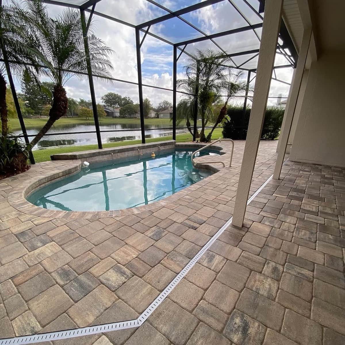 Pool deck surface restored with soft wash cleaning