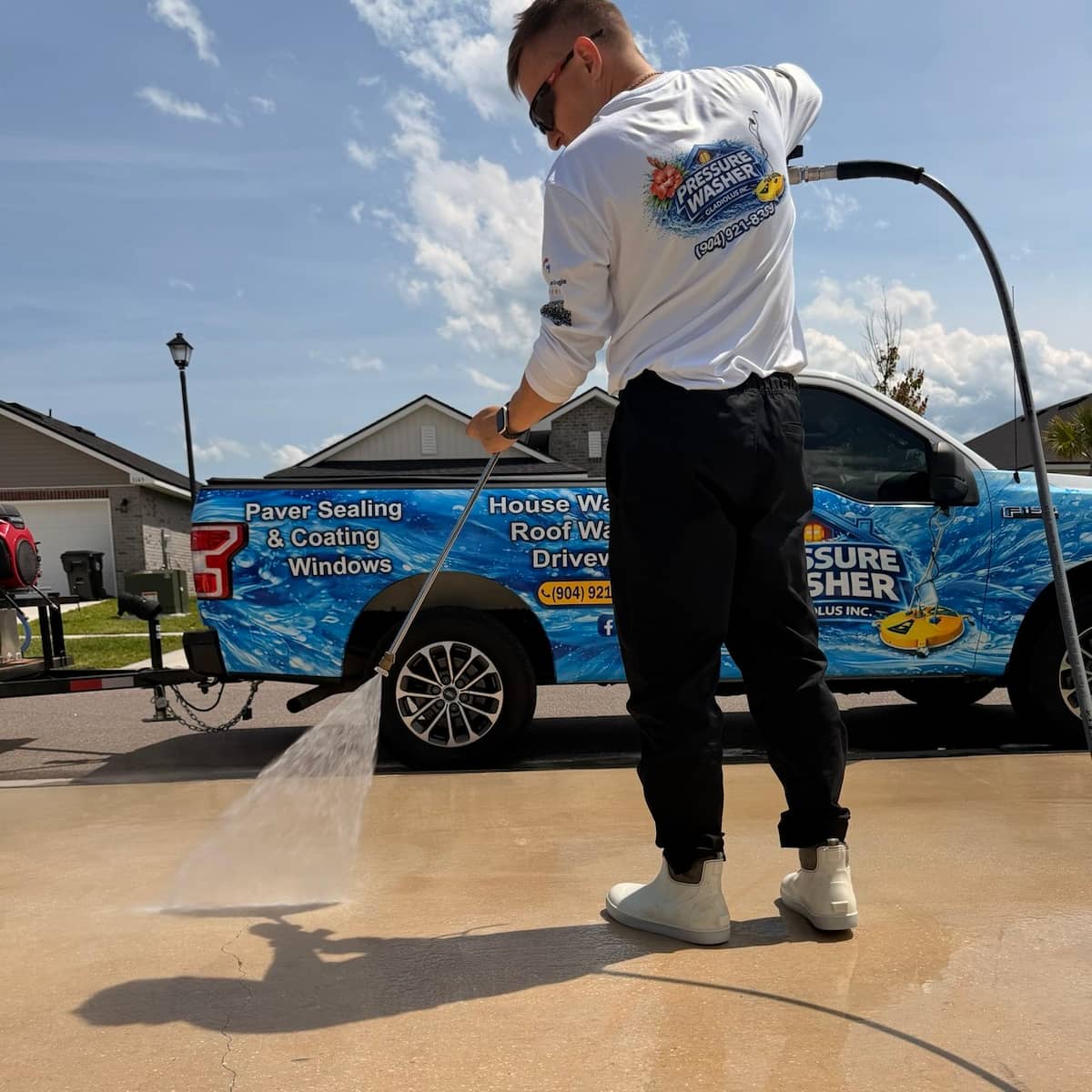 Concrete driveway cleaning transformation in Jacksonville