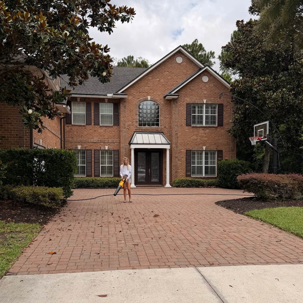 Before and after driveway pressure washing in Jacksonville, FL